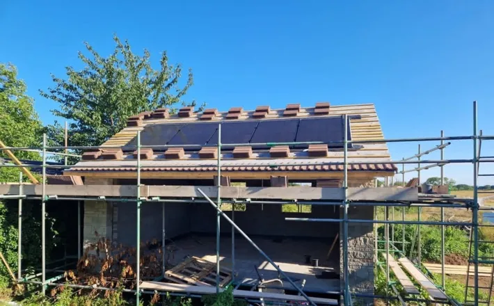 New roof on a scaffolded extension, work in progress